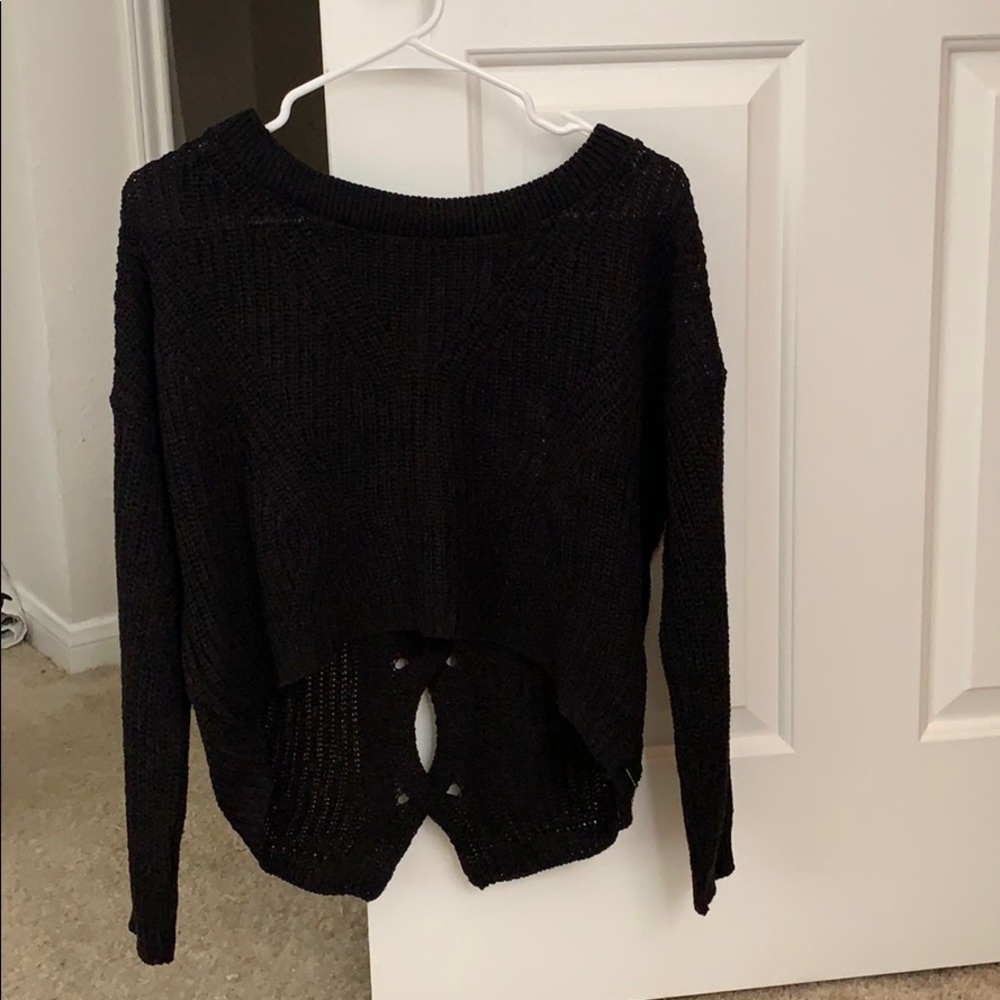 Black knit sweater with criss cross back